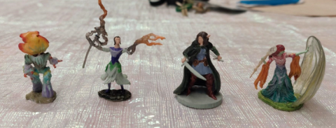 image shows a variety of miniature tabletop rpg figures